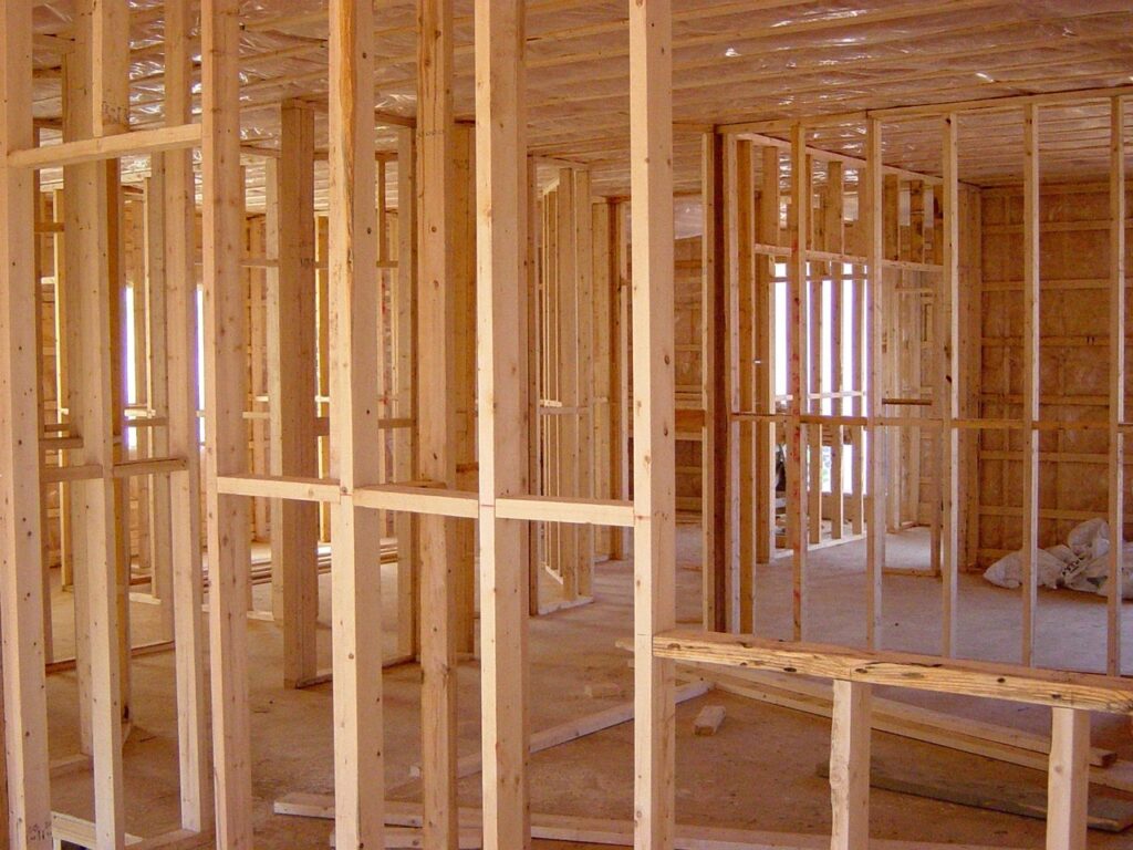 Wood being used to frame a building