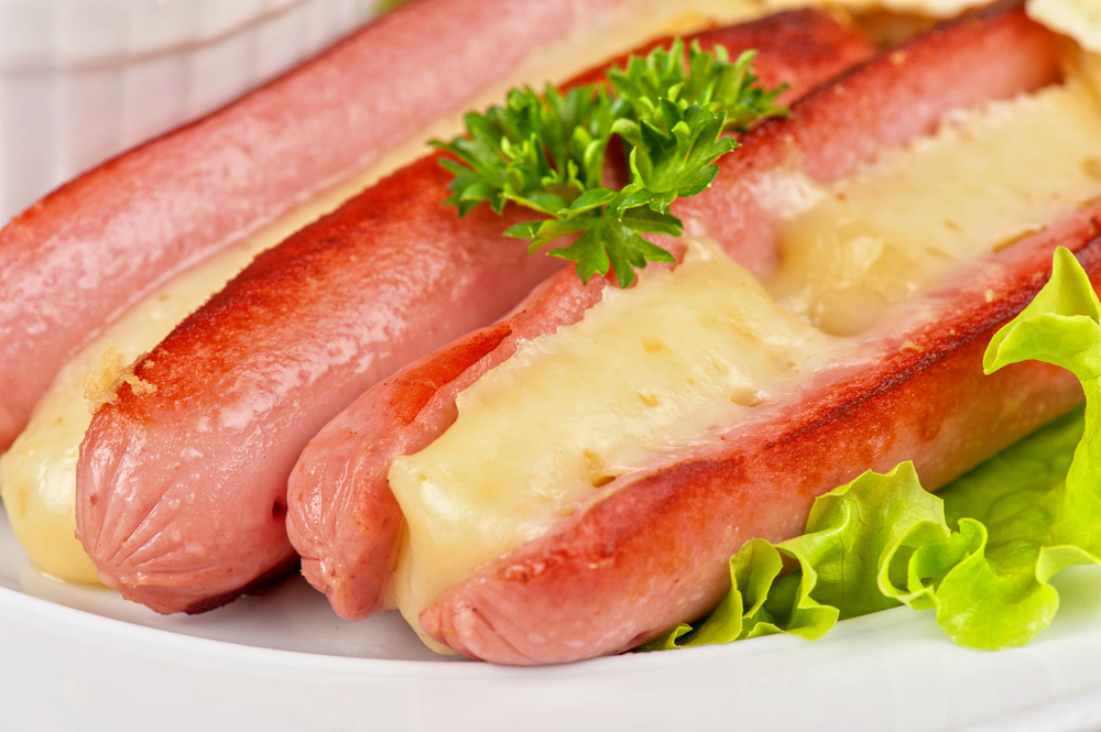 Sausages with cheese and omelette — Stock Photo, Image