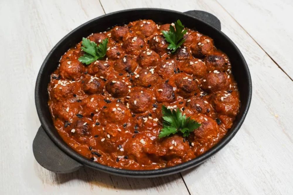 Tender glazed meatballs with sesame. Top view. — Stock Photo, Image