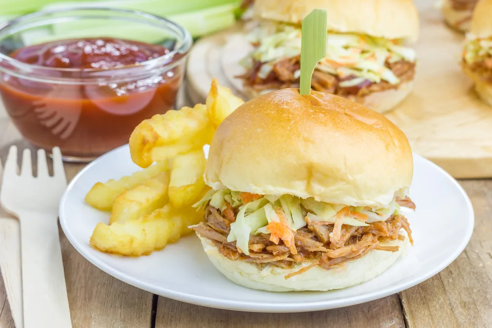 Beef brisket sliders on a white plate — Photo