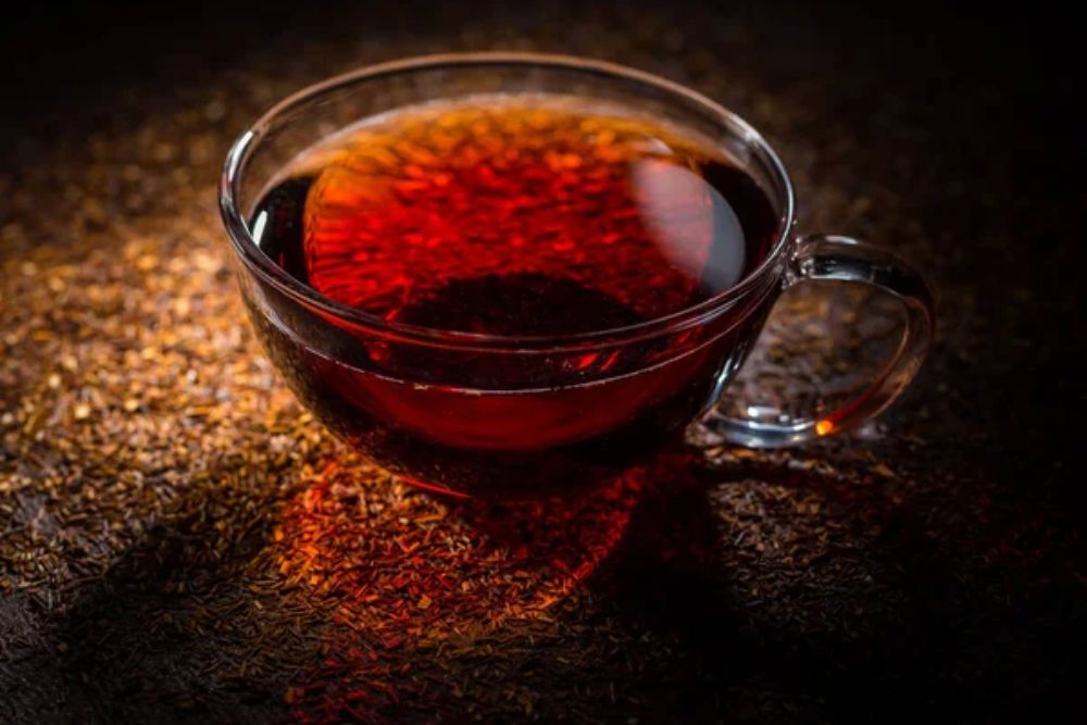 Remove BG
Save
Share
Sample
Cup of delicious rooibos tea on dark background — Photo