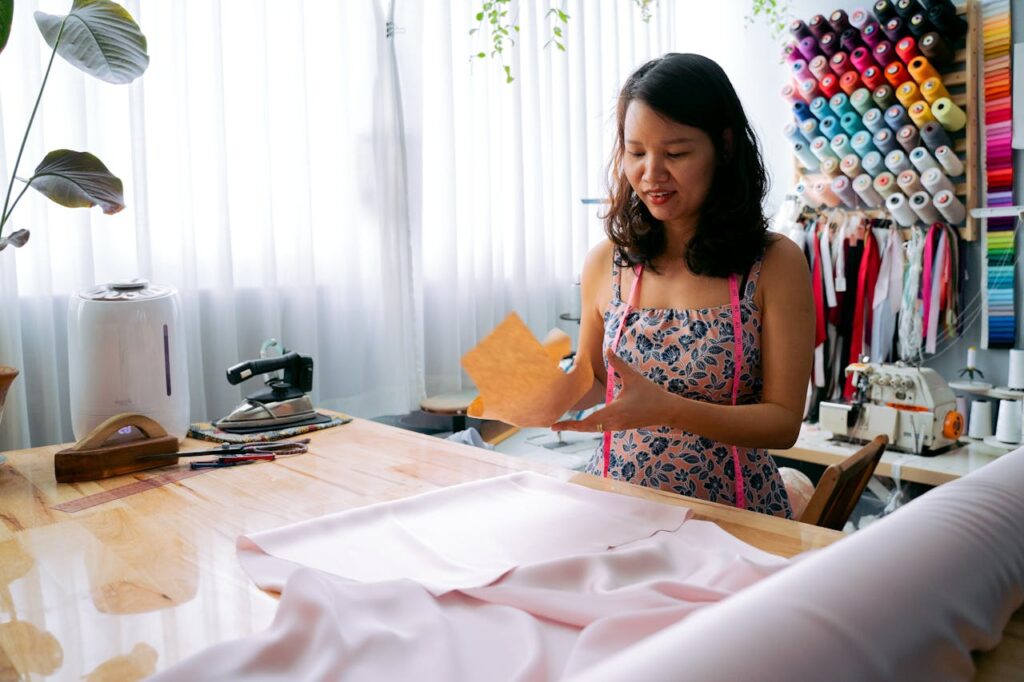 a woman crafting in a room where where she was organizing craft supplies 
