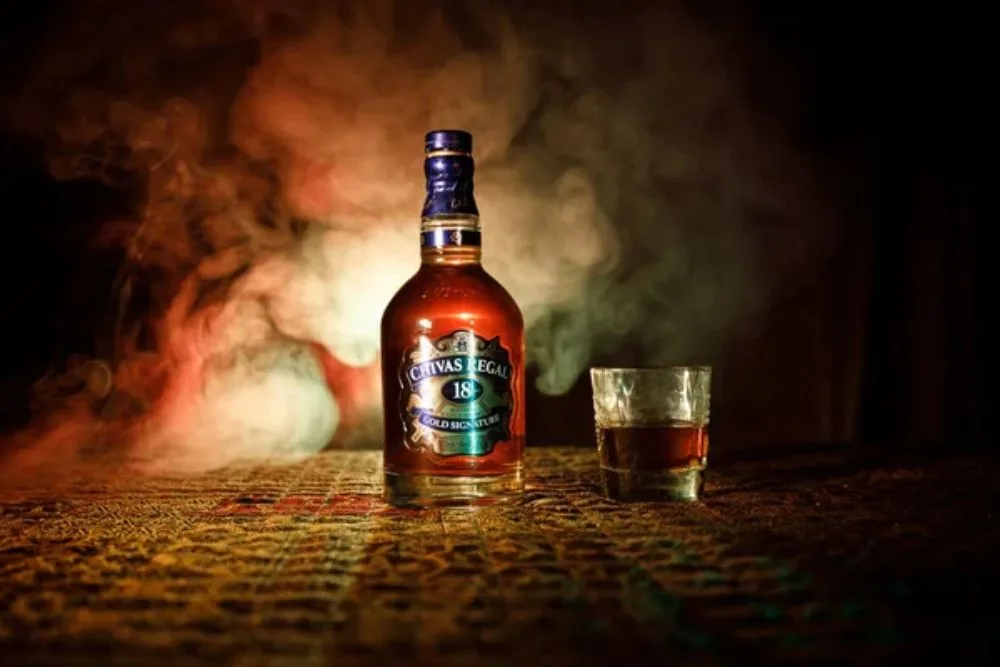 BAKU, AZERBAIJAN - MARCH 25, 2018: Blended from whiskies matured for at least 18 years, Chivas Regal 18 Gold Signature is a blended Scotch whisky produced by Chivas Brothers in Keith, Scotland. — Photo by zeferli@gmail.com