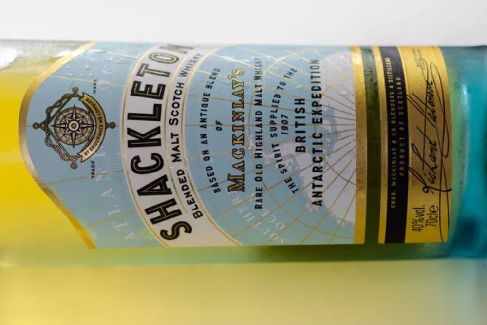 LONDON, UNITED KINGDOM - AUGUST 20, 2021 Bottle of Shackleton, rare old highland malt whisky, based on antique blend of Mackinlay's, made at a Scottish distillery — Photo by Q77photo
