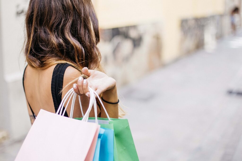 A girl holding shopping bags