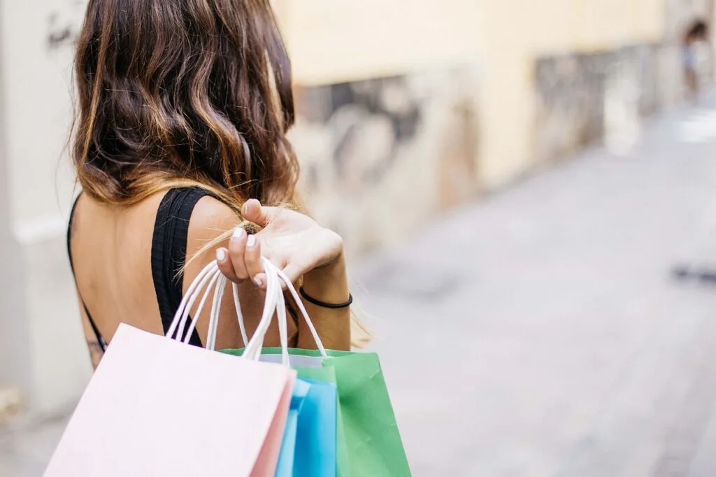 A girl holding shopping bags