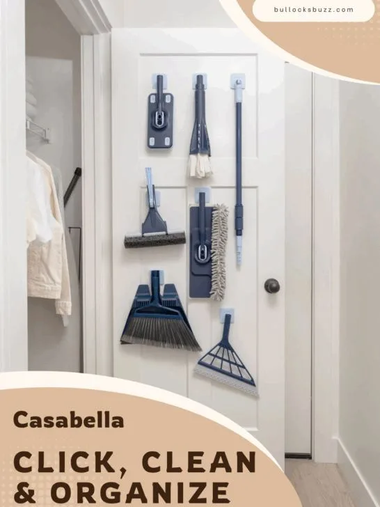 Image shows the Casabella Click Clean and Organize collection hanging neatly on the back of a door, with multiple attachments organized in one spot.