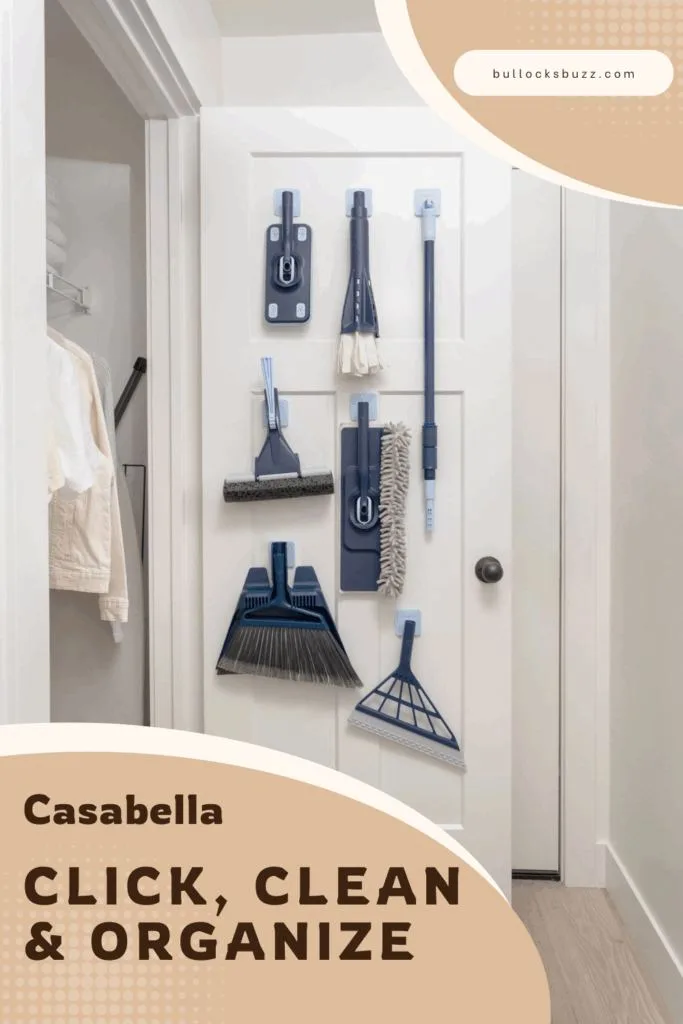 Image shows the Casabella Click Clean and Organize System hanging neatly on the back of a door, with multiple attachments organized in one spot.