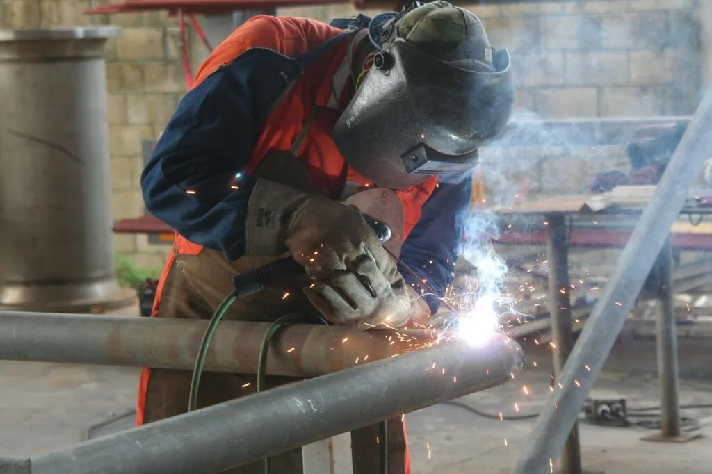 A welder wearing the right clothing for his job