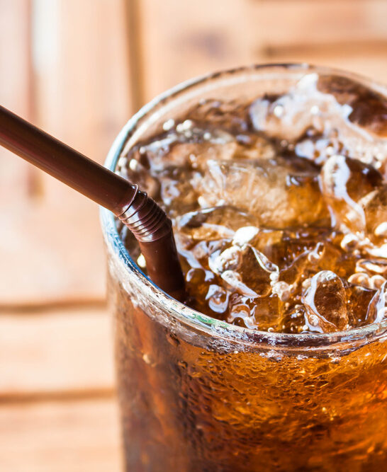 Cold glass with ice black soda drink — Stock Photo, Image