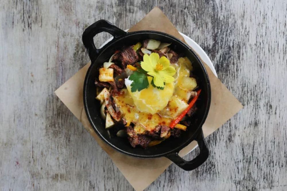 Bulalo Beef Potato Hash Skillet served in dish isolated on woo