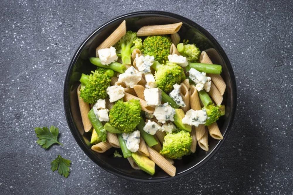 Whole-grain pasta penne with broccoli, avocado, green beans