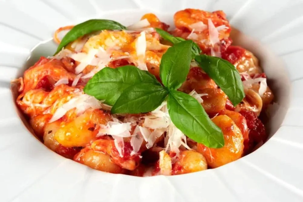 Oven baked gnocchi alla sorrentina, with tomato sauce