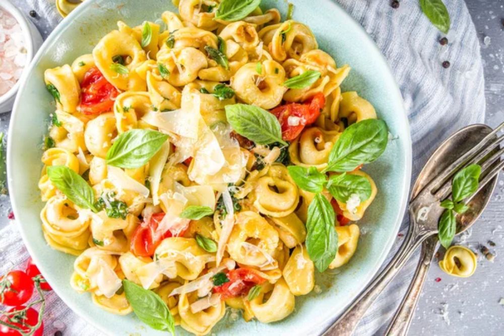 Italian ravioli, tortellini pasta with parmesan cheese and vegetable