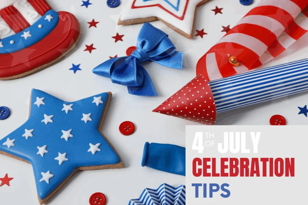 4th of July cookies, rockets and other celebration items on a white backdrop