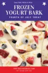 Close up image of frozen yogurt bark with strawberries and blueberries to make a red, white and blue treat
