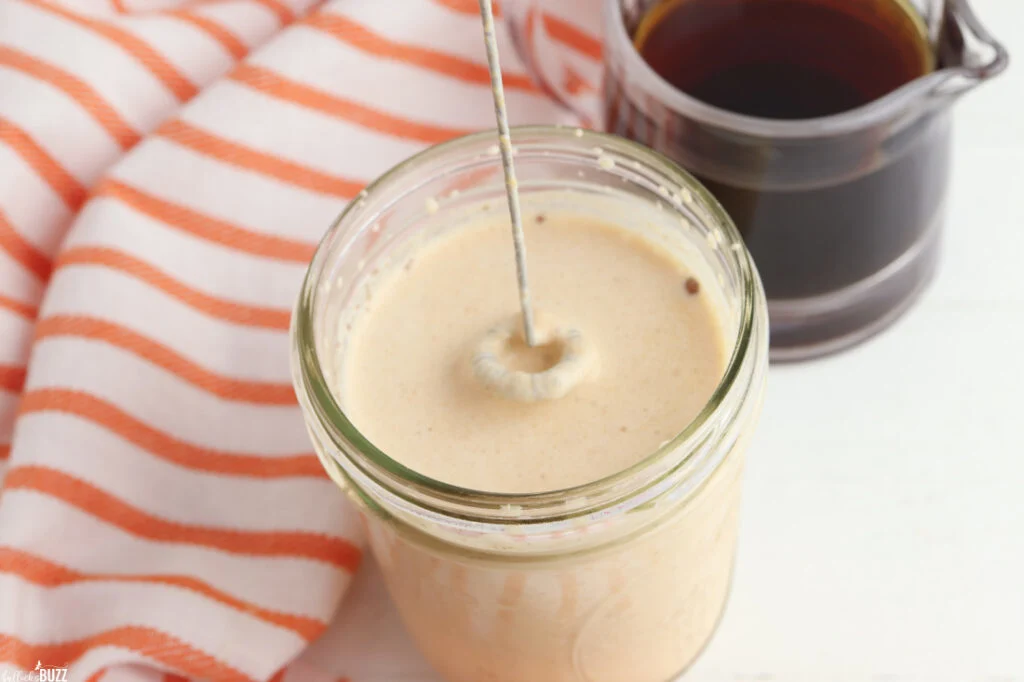 Mixing and frothing the ingredients with a frother