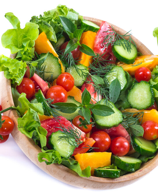 Salad with fresh cucumbers and tomatoes — Stock Photo, Image