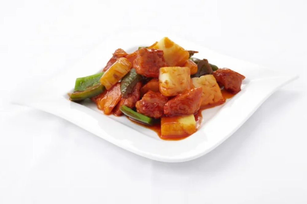 Sweet and sour sauce fried dish — Photo