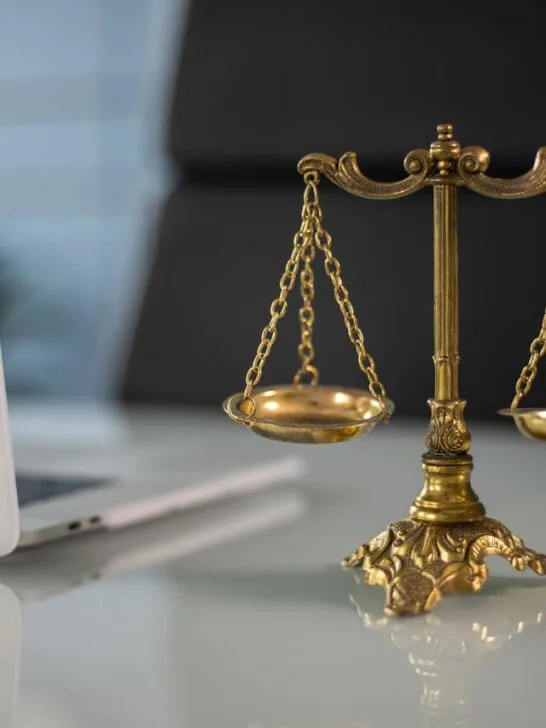 Scales of justice on a desk symbolizing understanding your legal rights and fairness in the law