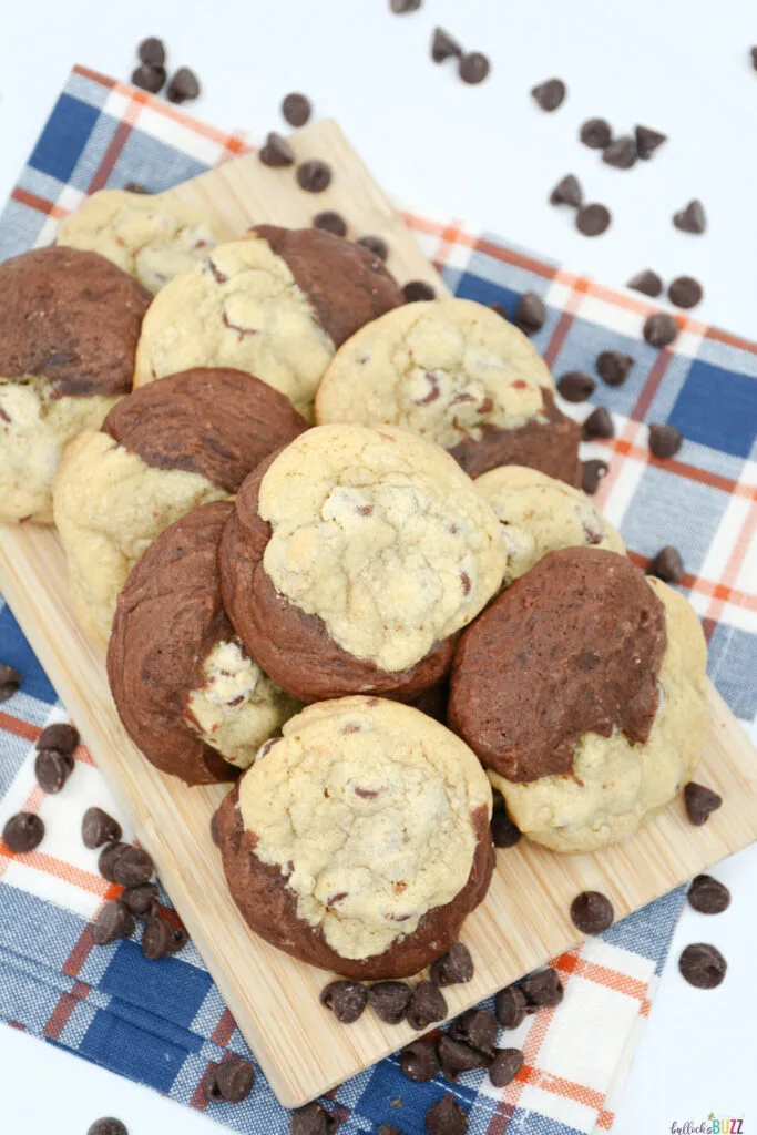 Overhead image of finished cookies on a board surrounded with chocolate chips