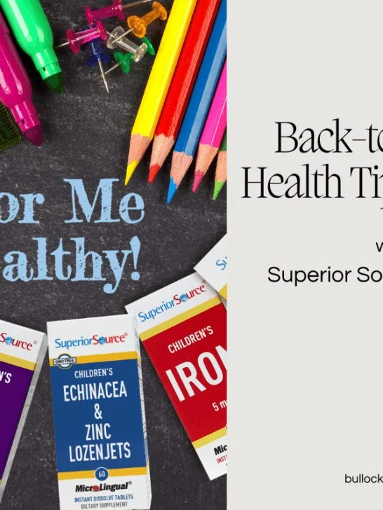 An image showing boxes of Superior Source Vitamins along with colorful school supplies om a chalkboard background