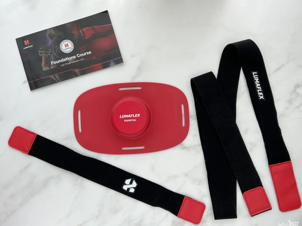 Lumaflex Essential FDA-cleared red light therapy wrap with straps and Foundations Course booklet for safe, portable pain relief