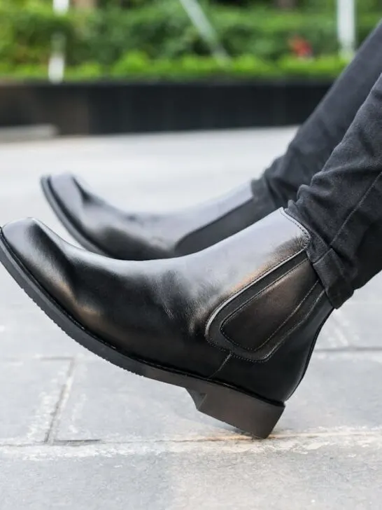Woman wearing timeless women&rsquo;s boots styled as chic ankle boots