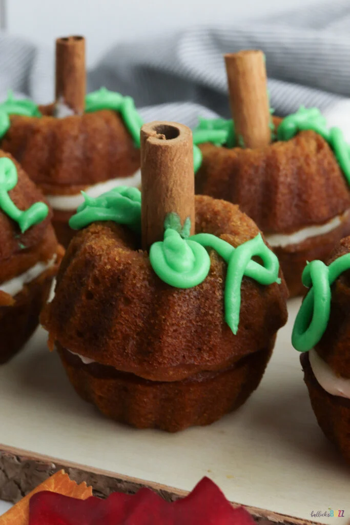 A close up view of finished pumpkin cakes