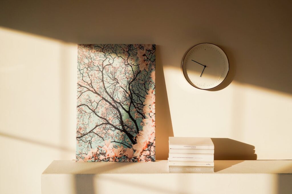 custom canvas prints featuring floral tree artwork displayed on a modern wall with soft natural lighting