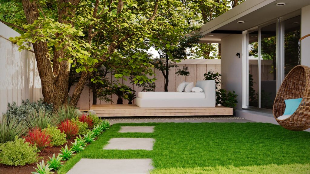 modern backyard with green lawn, shade trees, garden beds, and cozy outdoor seating area