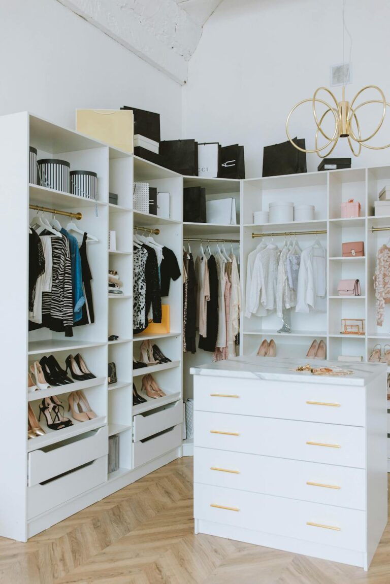 Organized white closet with shoes and clothing, showing how to refresh your wardrobe on a budget with smart styling and organization