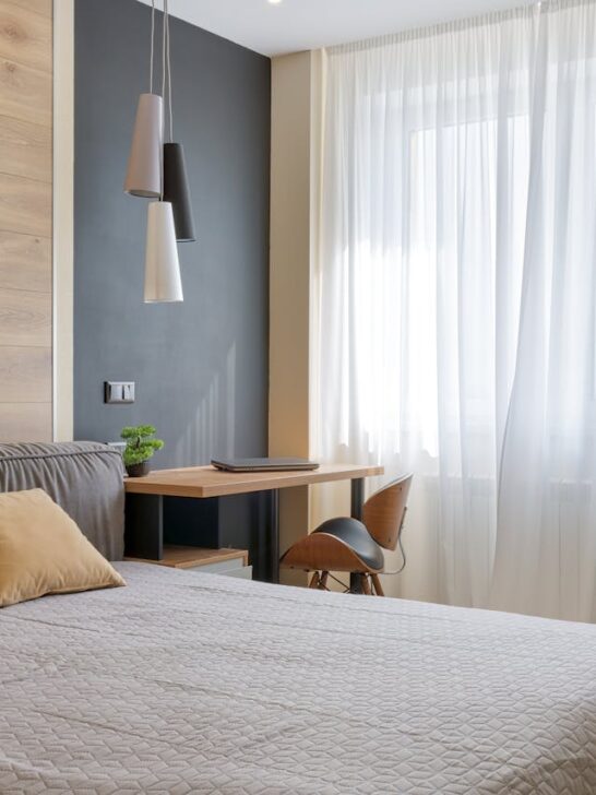 Cozy bedroom with wood panel accent wall ideas creating a warm and stylish backdrop behind the bed