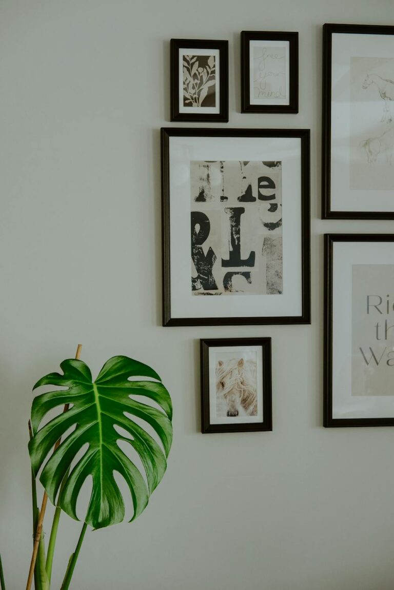 photo gallery wall idea with black frames around a variety of pictures