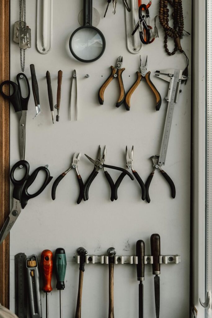 Hand tools arranged on a pegboard wall for easy access and organization