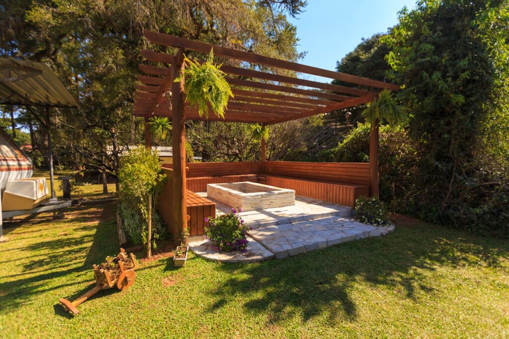 Backyard pergola with partial shade creating a cooler seating area when a backyard is too hot to sit outside