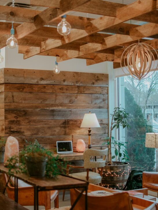 modern wood turning techniques in a warm home office with wooden ceiling beams and natural wood wall design