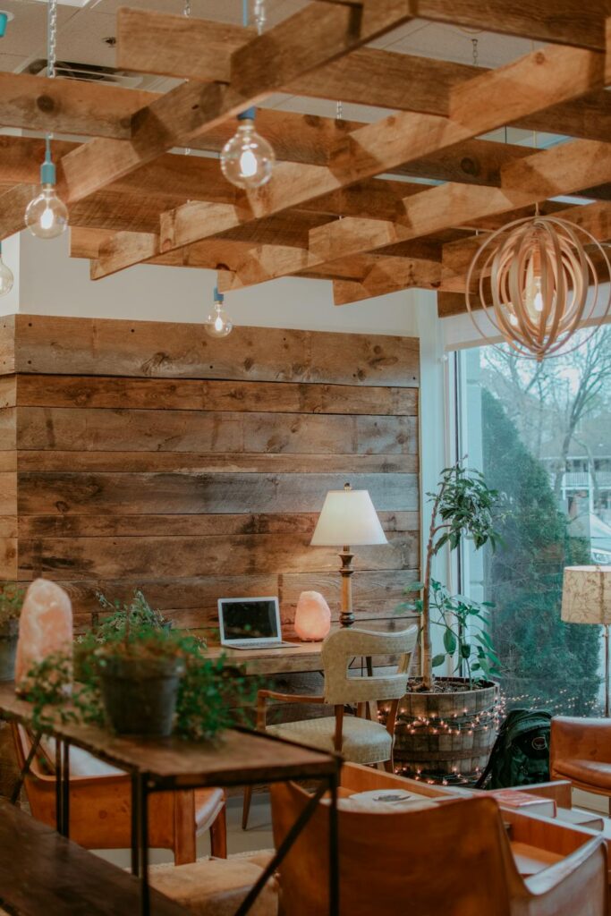 modern wood turning techniques in a warm home office with wooden ceiling beams and natural wood wall design