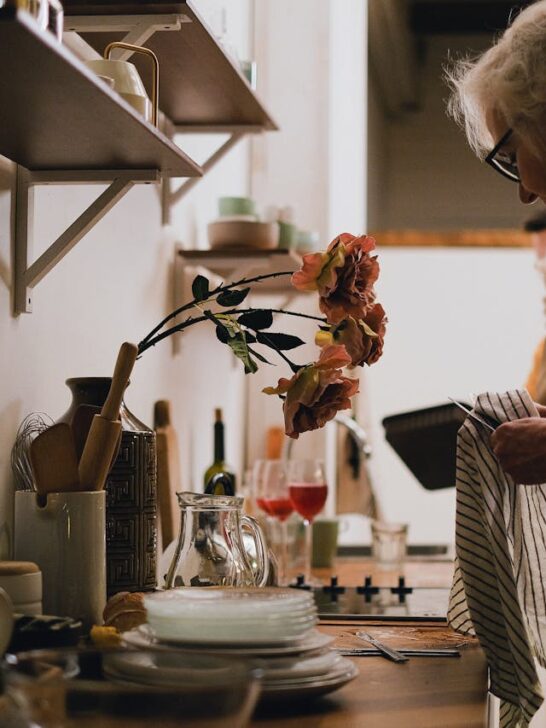 Senior woman completing daily tasks at home showing independent living tips for seniors