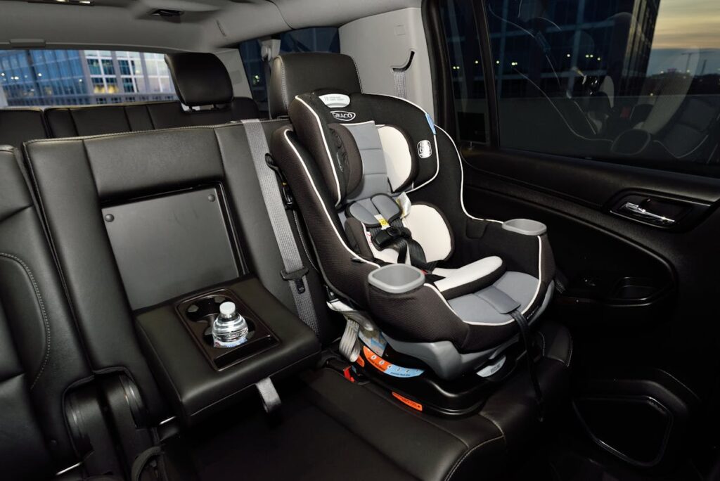 Child car seat installed in SUV interior highlighting important family-friendly vehicle features and safety technology
