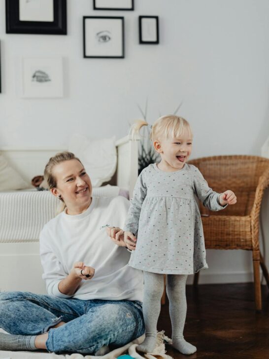 Mother and young child enjoying quality time together at home while building healthy family habits and routines.