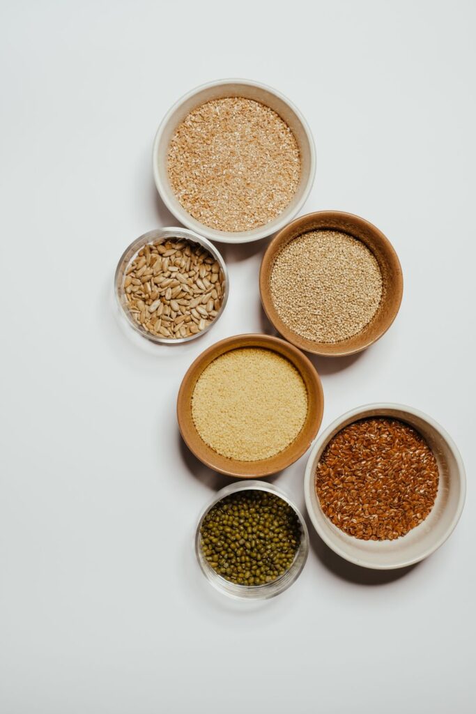 Bowls of grains, seeds, and legumes used as functional foods to support healthy eating and everyday nutrition.