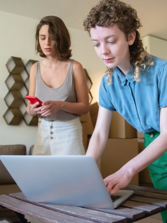 Small business owners preparing orders while learning how to sell children's jewelry online and grow an ecommerce business.