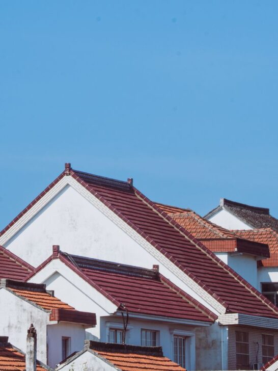 Modern homes with durable red tile roofs designed to withstand harsh weather and provide long-lasting protection.