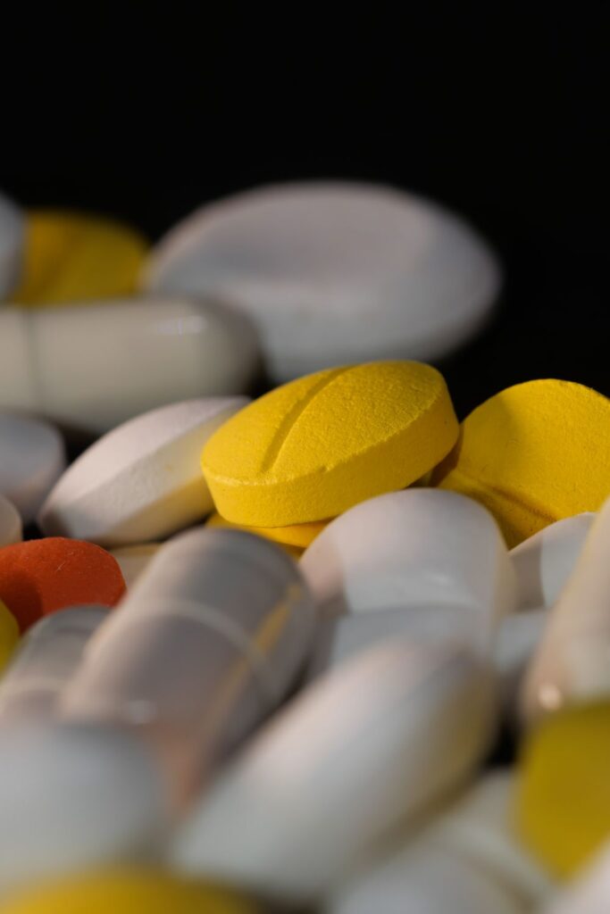Close-up of prescription pills representing medication, addiction treatment, and recovery support for substance use disorders.