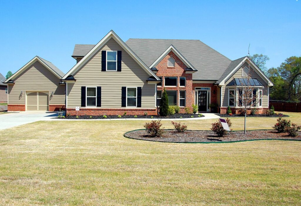 Completed new construction home with landscaped front yard