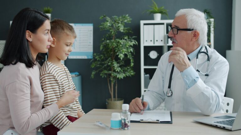 Effective communication in healthcare between a doctor, parent, and child during a medical appointment