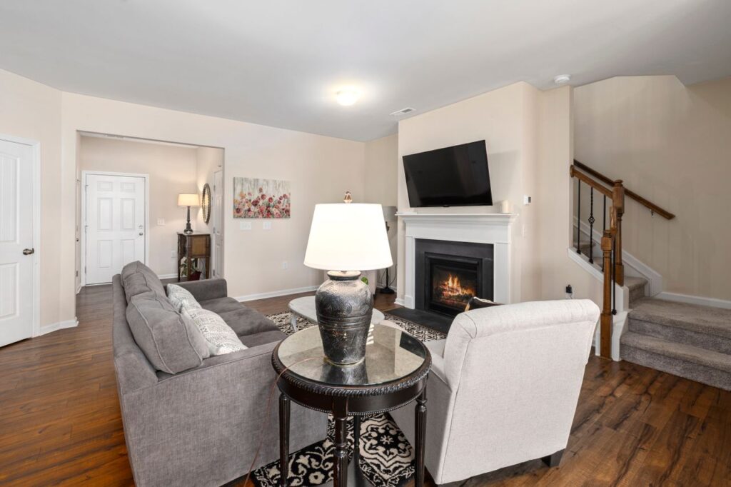 Image illustrating how to choose a coffee table that complements your sofa, seating arrangement, and available living room space.
