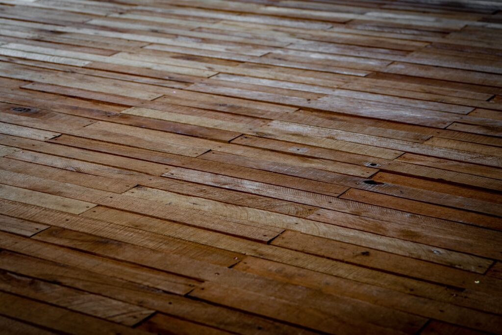Humidity and hardwood floors showing gaps and uneven movement between wood planks.
