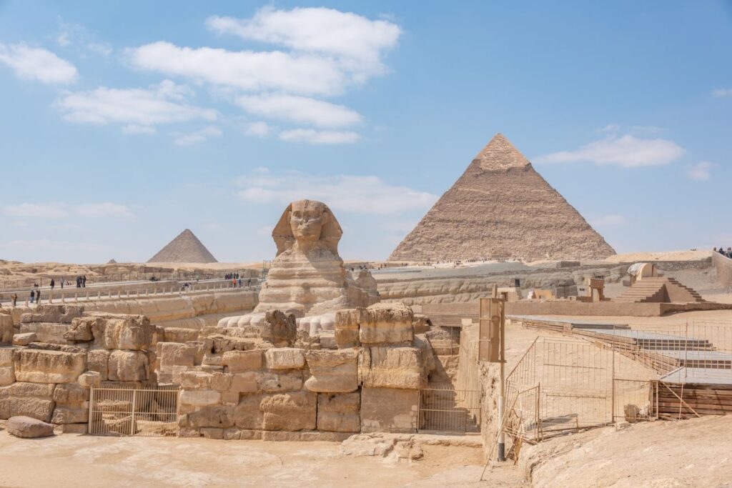 The Great Sphinx and pyramids at Giza, a historic stop for couples planning a honeymoon in Egypt.